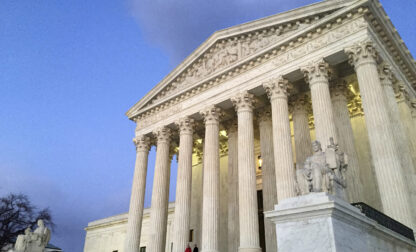 FILE - The Supreme Court at sunset in Washington, Feb. 13, 2016. (AP Photo/Jon Elswick, File)