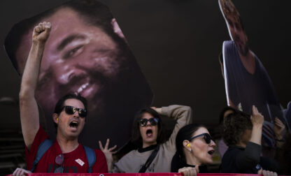 Demonstrators hold photos depicting the faces of Israeli hostages who are being held in the Gaza Strip, during a protest demanding their release from Hamas captivity, in Tel Aviv, Israel, Thursday, March 6, 2025. (AP Photo/Oded Balilty)