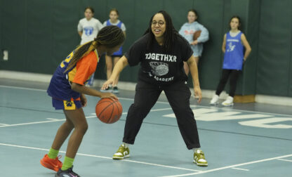 Coach Beulah Osueke works with the Chestnut Hill Youth Sports Club Lightning 6th grade girls basketball team in Philadelphia, Monday, Feb. 3, 2025. (AP Photo/Matt Rourke)