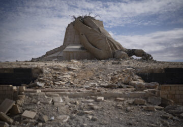 FILE - A destroyed statue of late Syrian President Hafez Assad is seen in Dayr Atiyah, Syria, on Jan. 5, 2025. (AP Photo/Leo Correa, File)