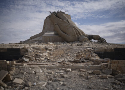 FILE - A destroyed statue of late Syrian President Hafez Assad is seen in Dayr Atiyah, Syria, on Jan. 5, 2025. (AP Photo/Leo Correa, File)