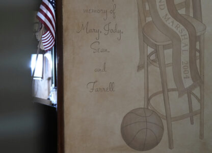 A painting that alludes to the bar's history with the NCAA college basketball tournament is seen at Jody's Club Forest in Staten Island, New York, Monday, March 10, 2025. (AP Photo/Seth Wenig)