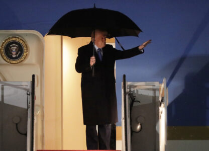 President Donald Trump waves from the stairs of Air Force One upon his arrival at Joint Base Andrews, Md., Monday, March 17, 2025. (AP Photo/Luis M. Alvarez)