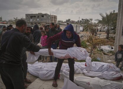 The bodies of victims of an Israeli army airstrike are prepared for burial at Indonesia Hospital in Beit Lahia, northern Gaza Strip, Thursday, March 20, 2025. (AP Photo/Jehad Alshrafi)